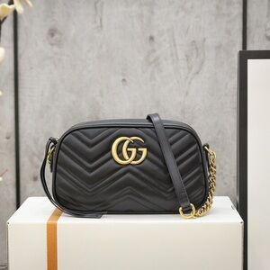 Gucci Black Quilted Crossbody Bag with Gold Accents